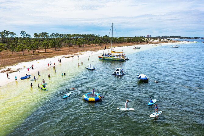 Shell Island Inflatable Adventure Park & Dolphin Sightseeing Tour - Shell Island adventure at a glance