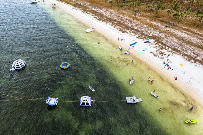 Shell Island Inflatable Adventure Park & Dolphin Sightseeing Tour - Weather, cancellations, and the dock walk