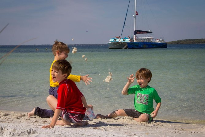 Shell Island Snorkel and Dolphin Catamaran Cruise with Island Time - Leaving Panama City Beach on a spacious catamaran
