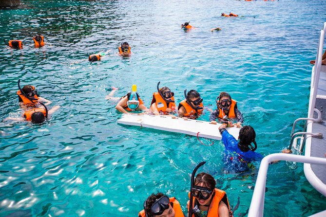 Similan Islands Snorkeling Tour By Speed Catamaran From Phuket - Ko Miang combines lunch, beach time, and a short walk