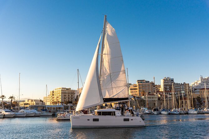 Small Group Santorini Catamaran Cruise with BBQ - Red Beach and the cliffs of Akrotiri