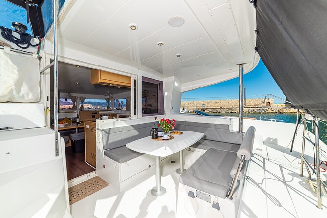 Small Group Santorini Catamaran Cruise with BBQ - The crew and the feel on board