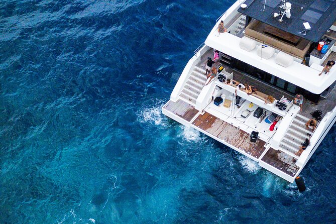Snorkel Trip on a Catamaran Yacht All Inclusive Experience - Fuik Bay turns the day toward lunch