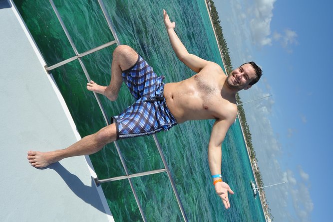 Snorkeling Catamaran Tour & Parasailing - Snorkeling and the underwater hookah activity