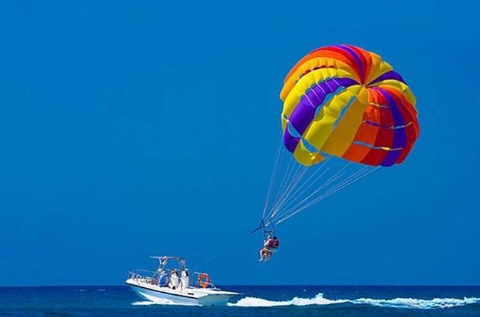 Snuba Snorkelking Parasailing and Catamaran Pack - Parasailing above Punta Cana’s water