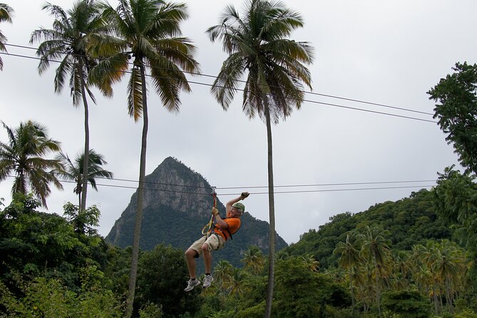 Soufriere Catamaran Excursion with Zip Lining from Castries - Cruising past Castries and St. Lucia’s west coast