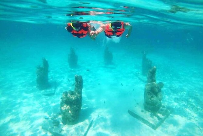 Splendid Isla Mujeres Catamaran: drinks and fun all day! - Ninety minutes to make Isla Mujeres your own
