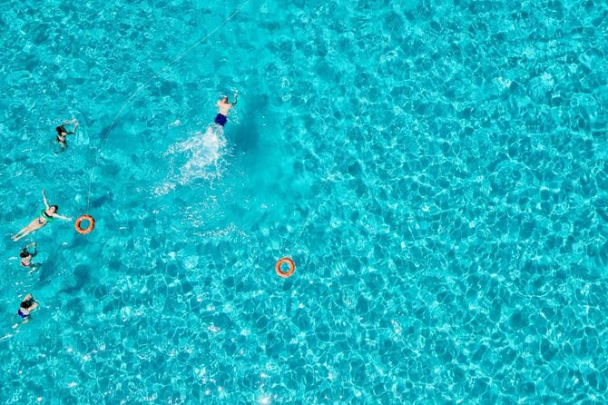 Stintino Half Day Catamaran Tour to La Pelosa with Aperitif - What this Stintino catamaran trip is really like