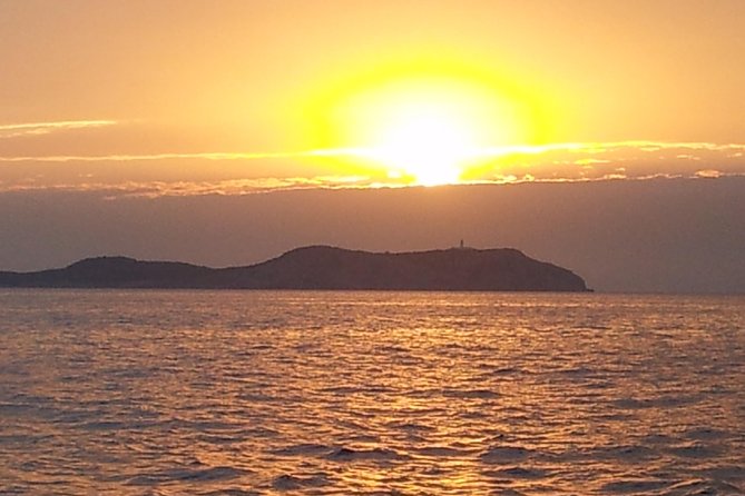 Sunset Catamaran Expedition in front of Cafe Mambo - Setting out from San Antonio at 1:30 pm