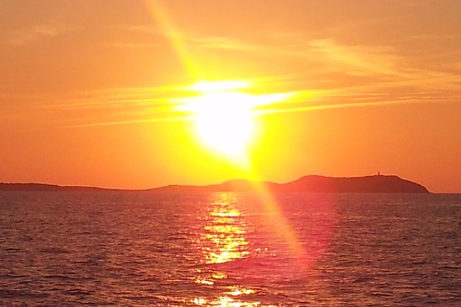 Sunset Catamaran Expedition in front of Cafe Mambo - Bringing your own food, drinks, and music