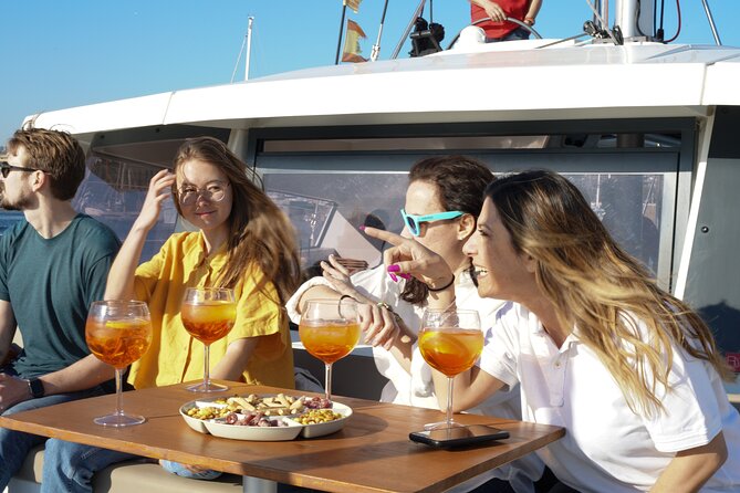 Sunset Catamaran: Small Group, Drinks, Snacks & Dinner Upgrade - Setting out from Barcelona Olympic Port