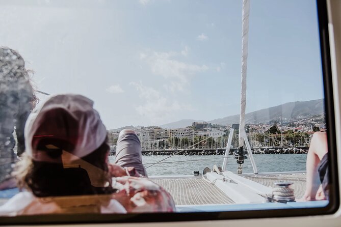 Sunset Catamaran Tour l Madeira Island - The swim stop in clear coastal water