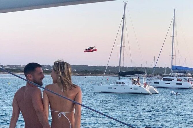 Sunset on a catamaran: from Es Vedrá to Cala Conta - Swimming and snorkeling in a sheltered cove