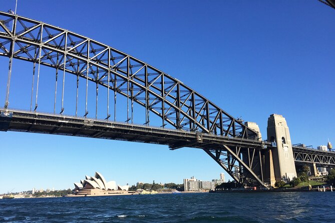 Sydney Harbour Highlights & Aussie Bites Catamaran Cruise - Passing beneath the Harbour Bridge