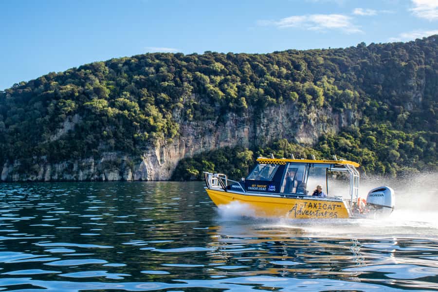 Taupo: Lake Taupo Western Bays Catamaran Tour with Bush Walk - The ride toward Otupotu Falls