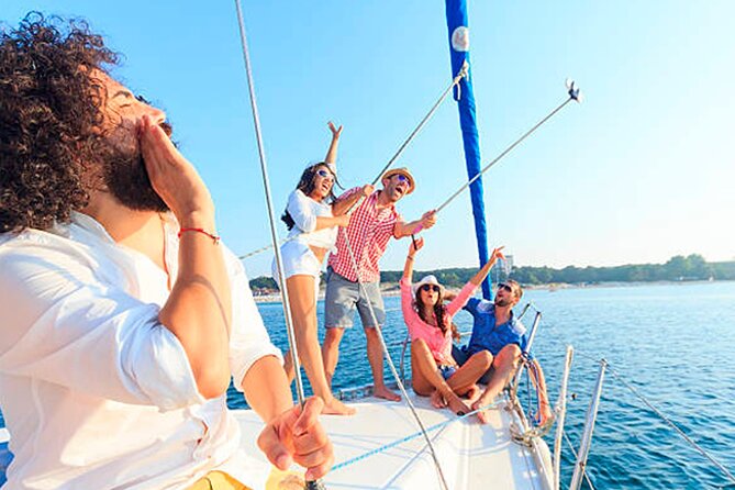 The Best Catamaran Tour to Isla Mujeres from Cancún - Sailing toward Isla Mujeres with an open bar