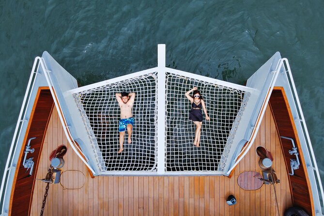The Halong Catamaran Premium Day Cruise From Ha Long Bay - Sunset tea, fruit, and the ride back