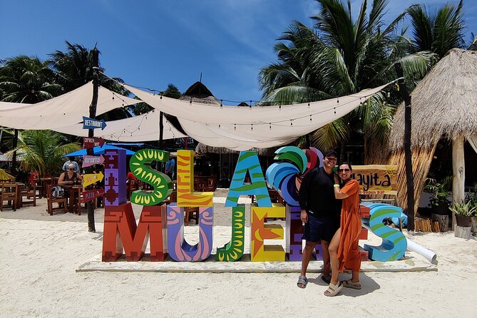 Top Isla Mujeres Catamaran Tour with Snorkel Open Bar and Buffet lunch - Open bar, music, and the spinnaker ride