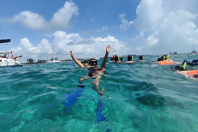 Top Isla Mujeres Catamaran Tour with Snorkel Open Bar and Buffet lunch - Getting from Cancun to the catamaran