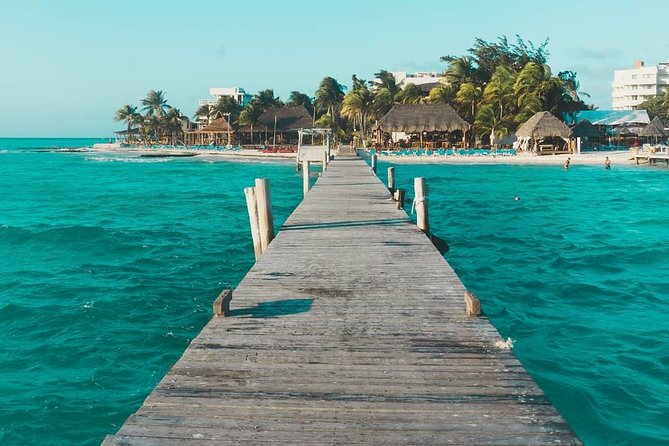 Tour in a Catamaran to Isla Mujeres with all included for the best price! - Spinnaker sailing above the Caribbean