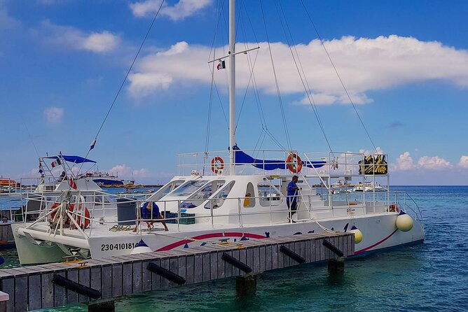 Tour to Cozumel by Catamaran with Snorkeling and Buffet Lunch - Boarding the catamaran in Cozumel