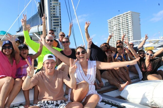 Trip to Isla Mujeres by Catamaran, with snorkeling and drinks - Transport, timing, and group size
