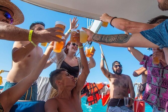 Trip to Isla Mujeres by Catamaran, with snorkeling and drinks - Starting in Cancun: marina meeting or hotel pickup