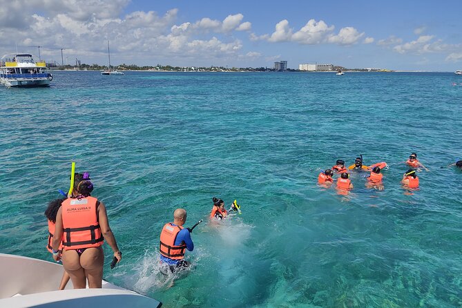 Trip to Isla Mujeres - Catamaran Unlimited Adventure from Playa del Carmen - Playa Norte, shopping, and the need to watch the clock