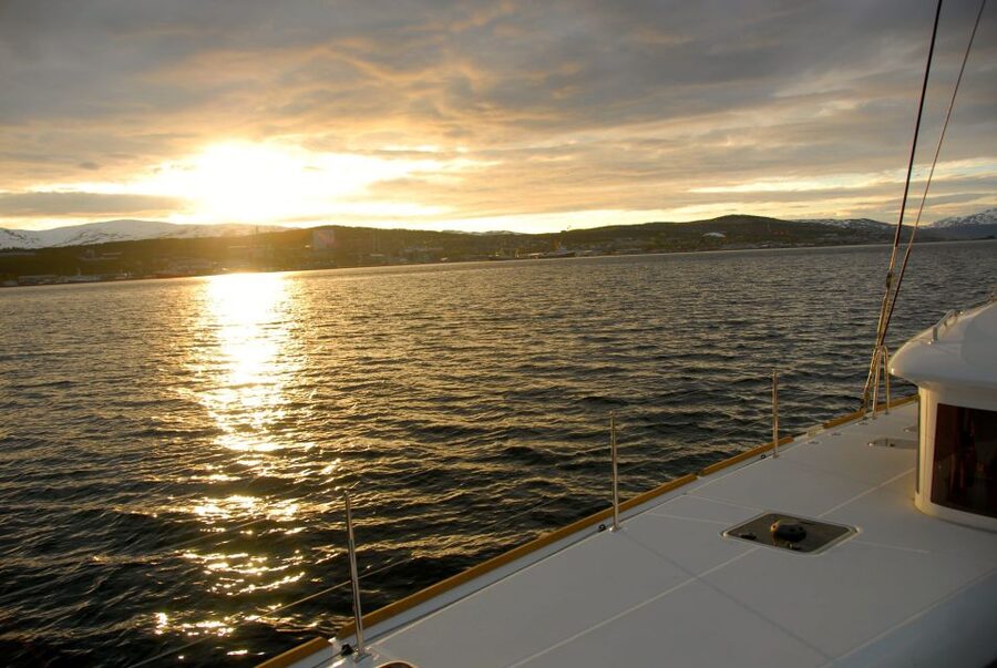 Tromsø: Midnight Sun Cruise in a Luxury Catamaran - Fishing adds a welcome change of pace