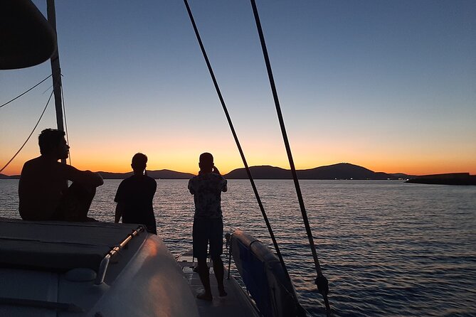 unique aperitif experience at sunset on a catamaran - The Maddalenetta lighthouse stop
