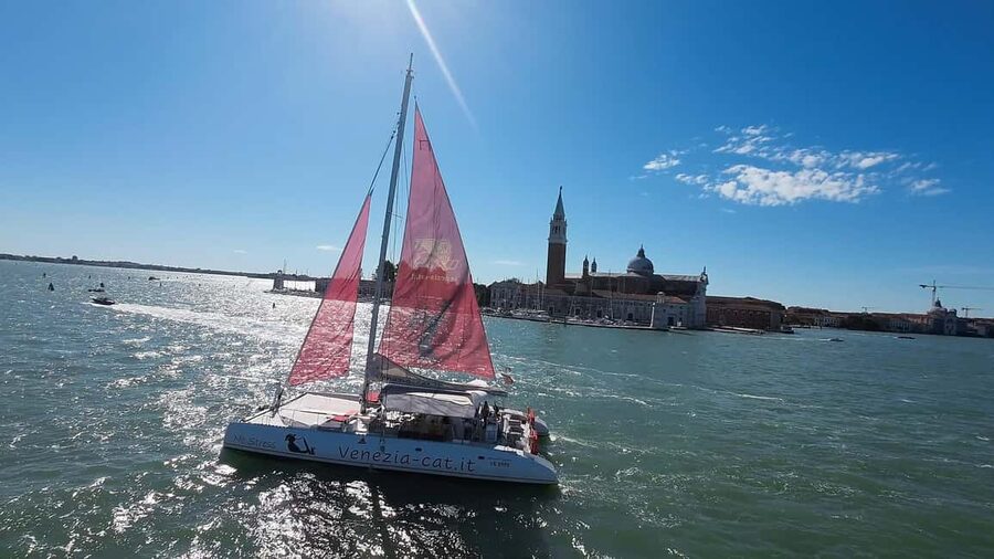 Venice: Lagoon Catamaran Tour with Classical Music & Drinks - Across the Lagoon Toward Lido