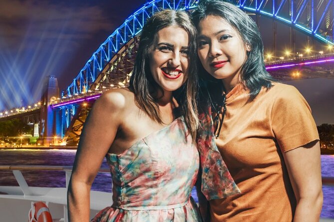 Vivid 90-Minute Sydney Harbour Intimate Catamaran Cruise with Canapes - Under the Harbour Bridge at the start