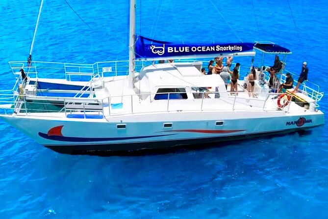 Waikiki Catamaran Escape: Snorkel with Turtles & Water Sports Fun - Snacks, drinks, and the practical comforts